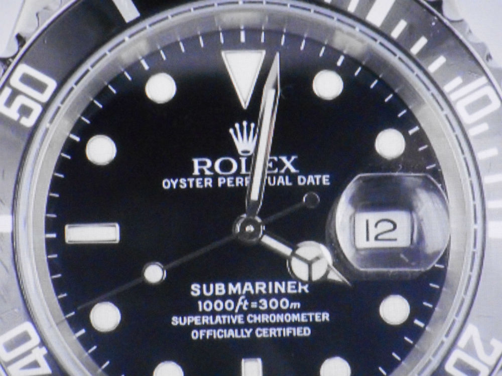 ROLEX Submariner 16610 année 2006 série D - sous garantie